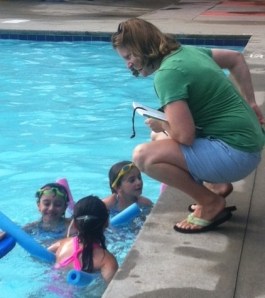 Barracudas ladies checking on their times!